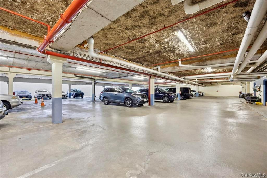 136-24 Maple Avenue, Unit 6F Queens, NY 11355 - Photo 19 of 29 a view of parking