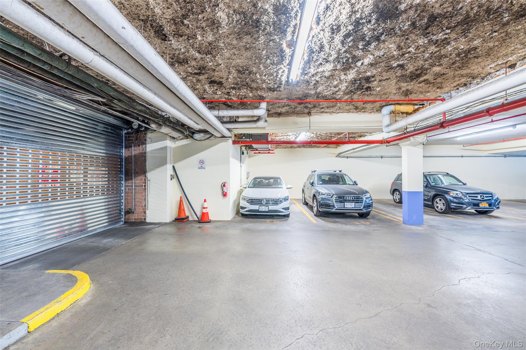 136-24 Maple Avenue, Unit 6F Queens, NY 11355 - Photo 20 of 29 a view of parking garage