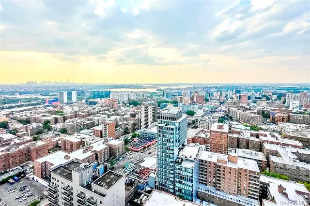 a view of city with lots of tall buildings