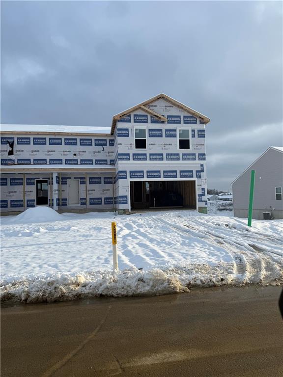 a view of a balcony with two chairs