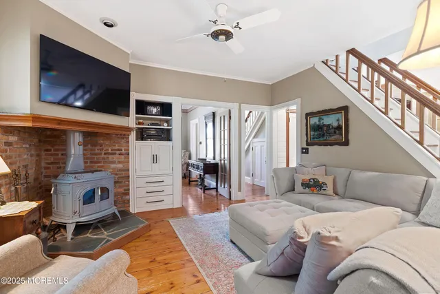 a large kitchen with a table and chairs