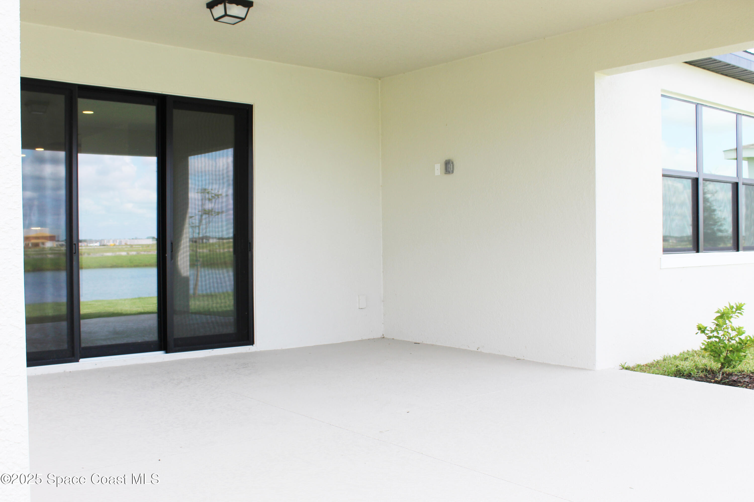 8528 Rocard Court Melbourne, FL 32940 - Photo 7 of 9 CharlotteII_3FF_lanai