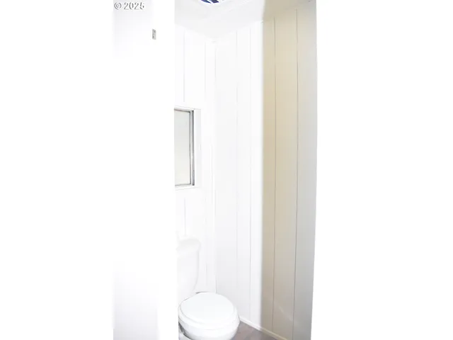 a bathroom with a toilet