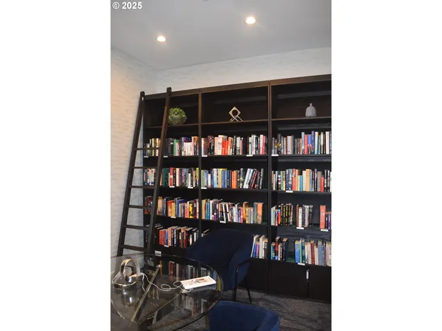a view of a table and chairs in a room