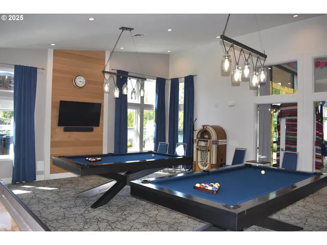 a room with gym equipment and a large window