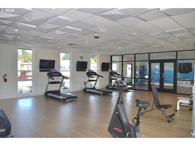 a view of a room with gym equipment