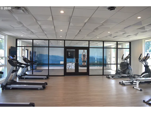 a view of a room with gym equipment