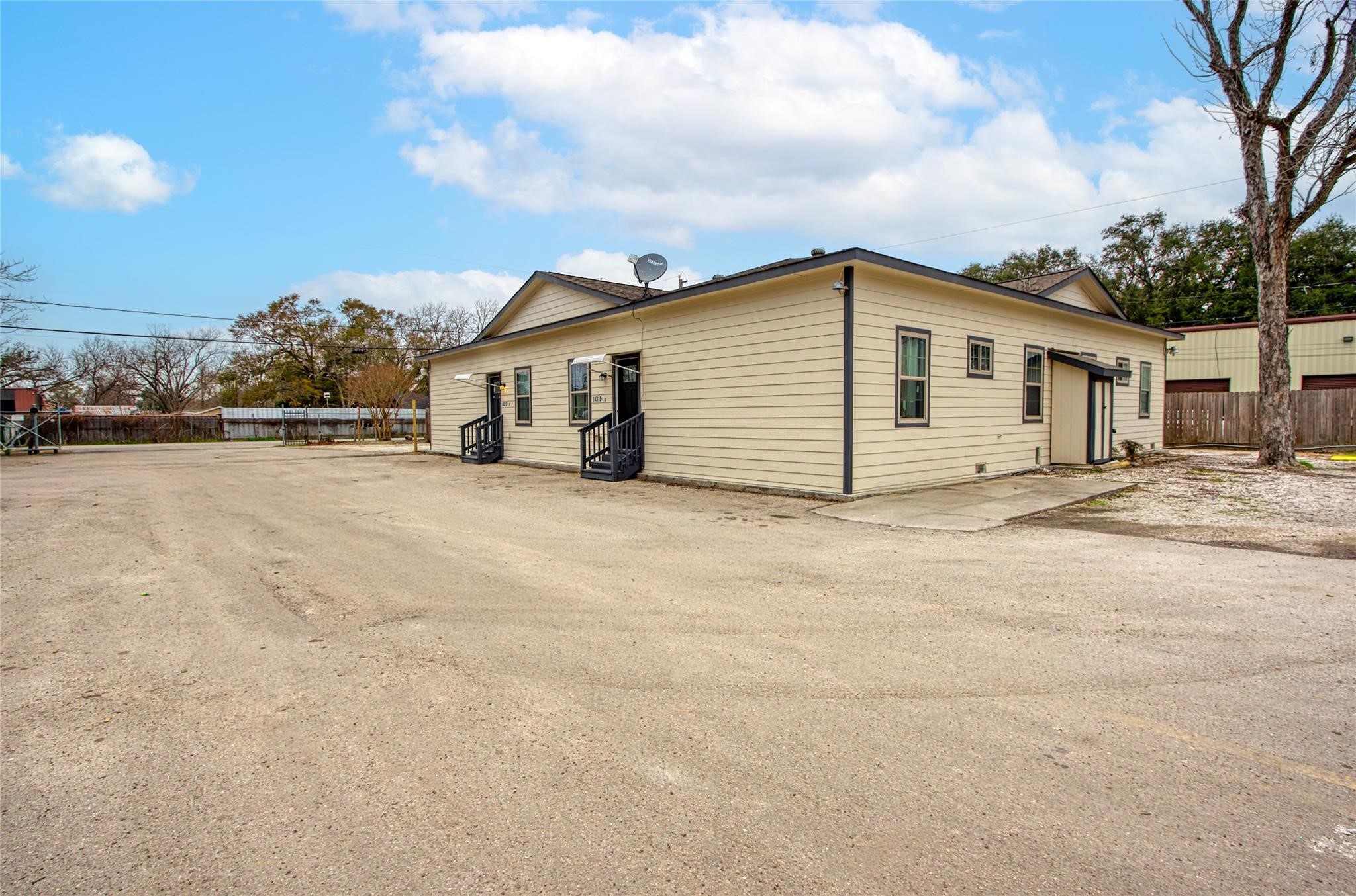 14310 Sweeney Road Houston, TX 77060 - Photo 2 of 14 a view of a house with a yard