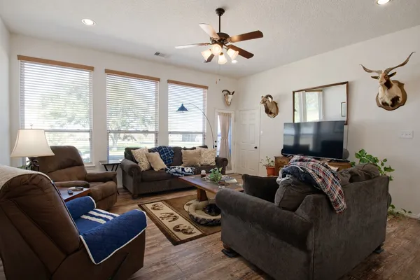 a bedroom with a bed and a couch