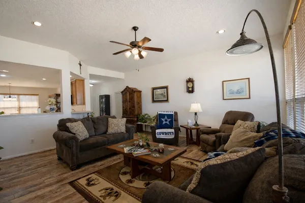 a bathroom with a bathtub and a window
