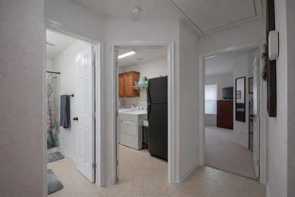 a view of a room with wooden roof