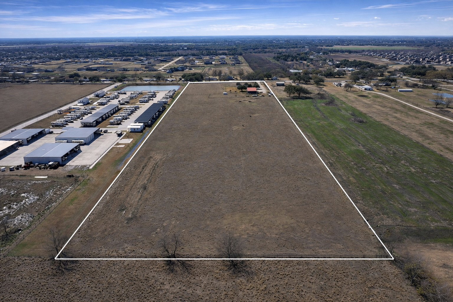 9439 Jeske Road Needville, TX 77461 - Photo 4 of 48 an aerial view of a city