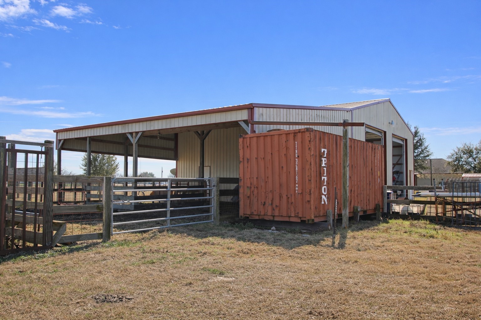 9439 Jeske Road Needville, TX 77461 - Photo 44 of 48 a view of a house with wooden fence
