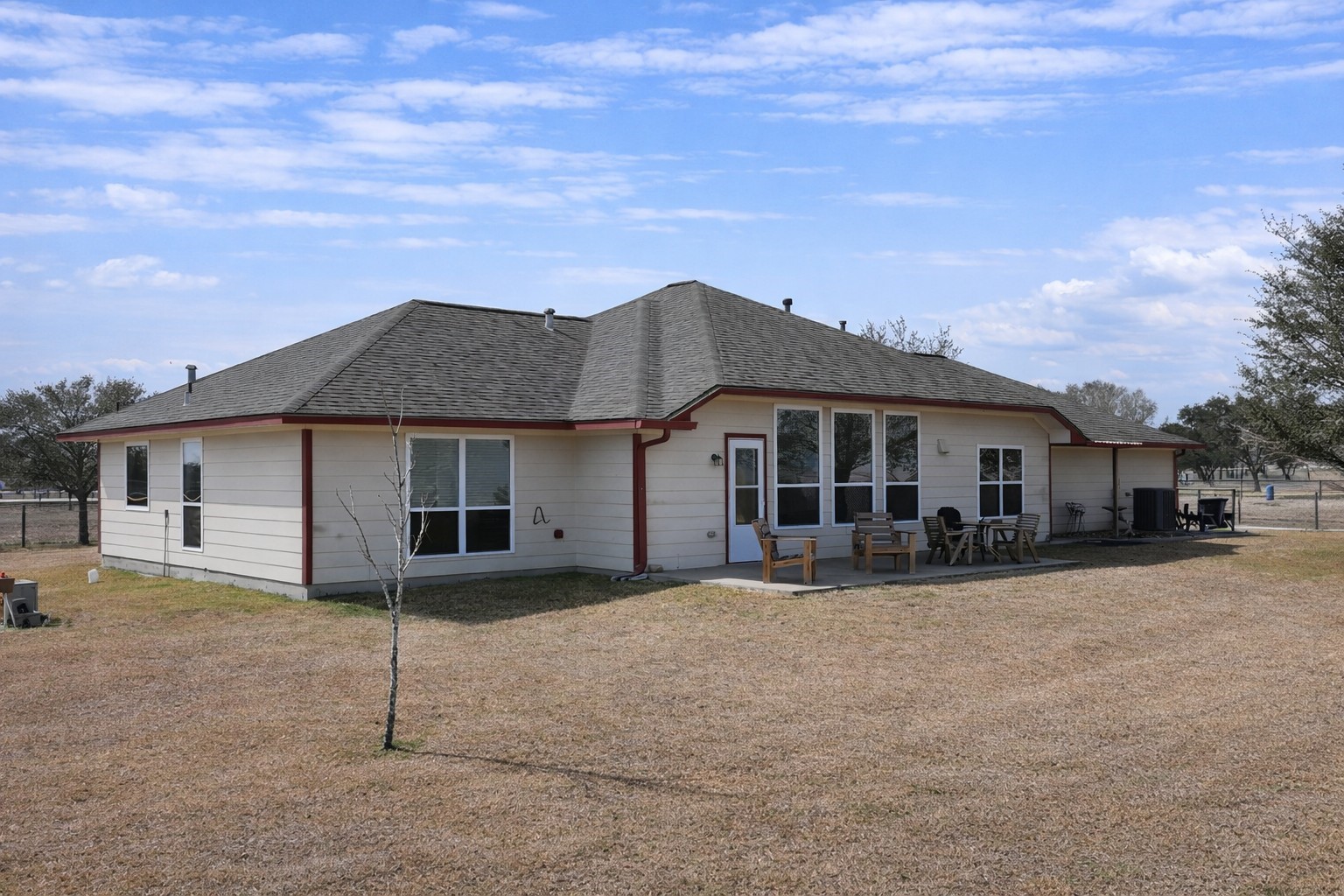 9439 Jeske Road Needville, TX 77461 - Photo 6 of 48 a front view of a house with a yard
