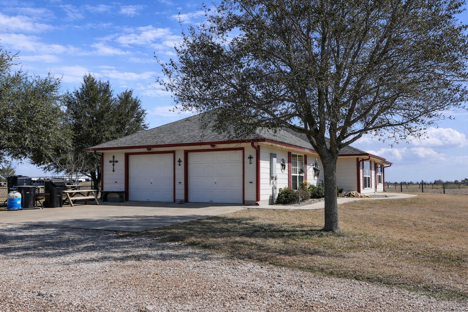 9439 Jeske Road Needville, TX 77461 - Photo 9 of 48 a front view of a house with a yard