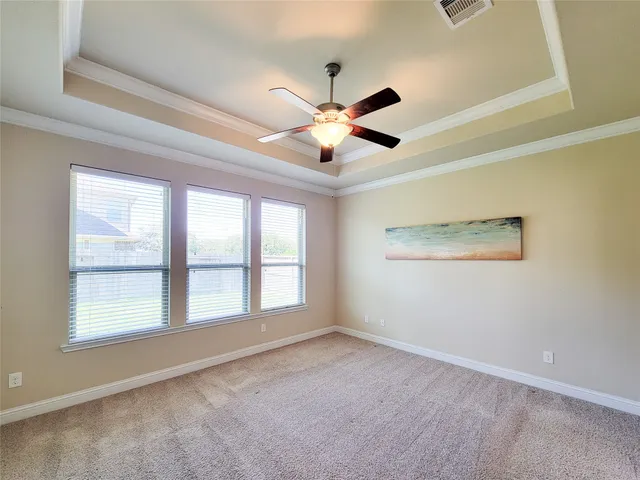 a bath tub sitting next to a window