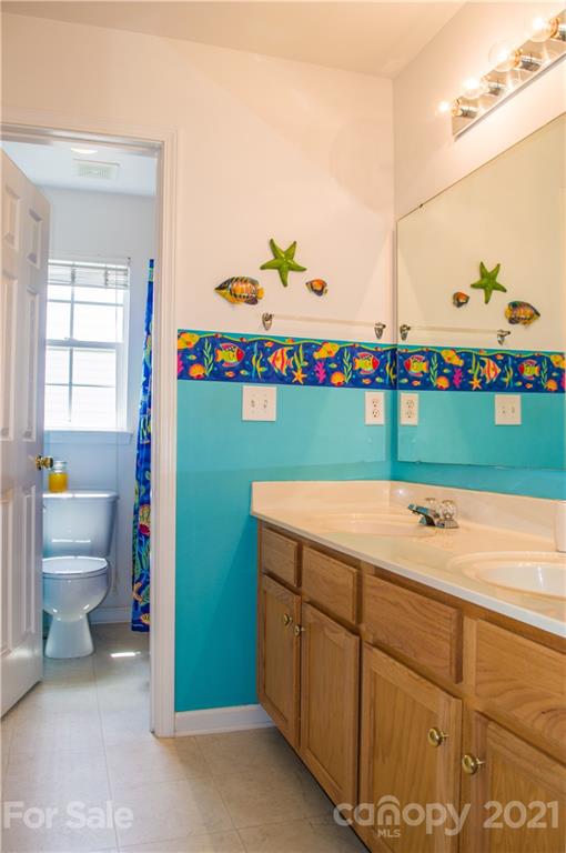 144 Amber Woods Drive Tega Cay, SC 29708 - Photo 16 of 37 a view of storage and utility room