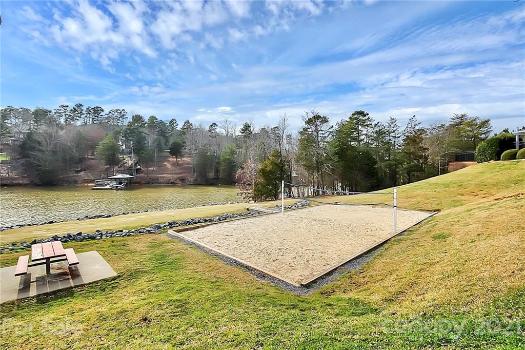 144 Amber Woods Drive Tega Cay, SC 29708 - Photo 23 of 37 a view of a swimming pool with an ocean view
