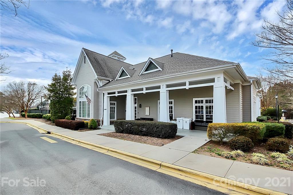 144 Amber Woods Drive Tega Cay, SC 29708 - Photo 24 of 37 a front view of a house with a yard