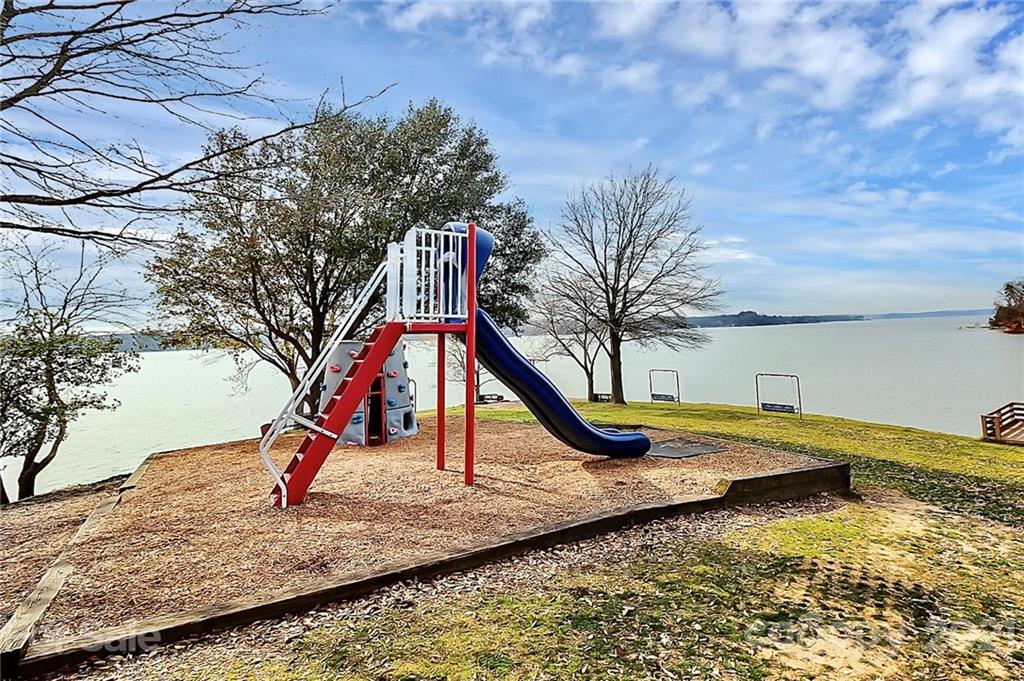 144 Amber Woods Drive Tega Cay, SC 29708 - Photo 25 of 37 a view of a ocean with a slide