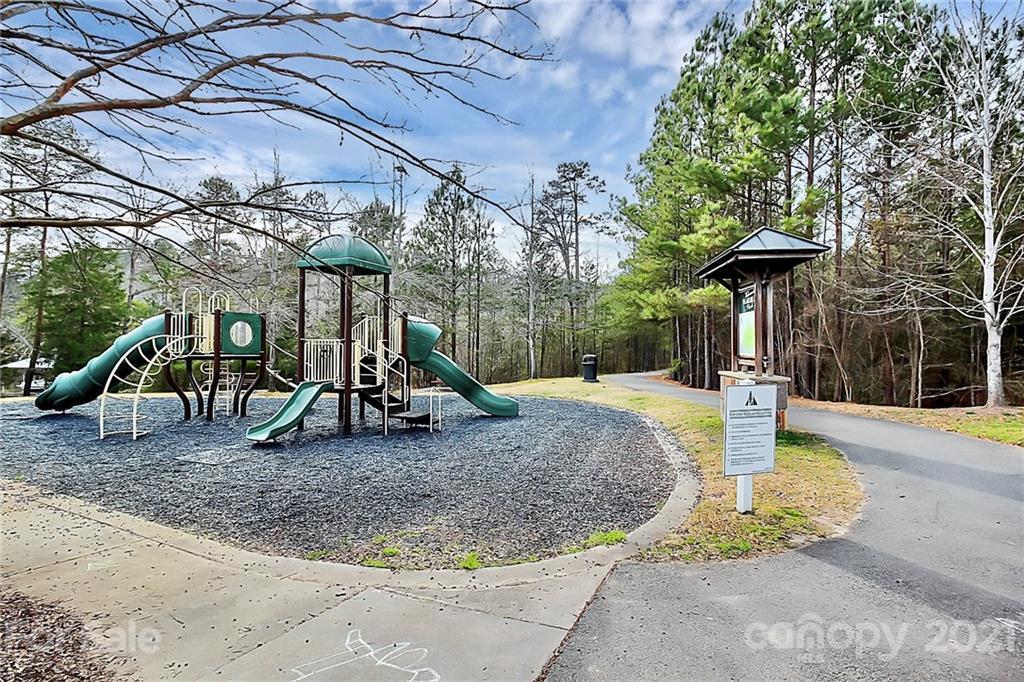 144 Amber Woods Drive Tega Cay, SC 29708 - Photo 28 of 37 a view of a park with slide