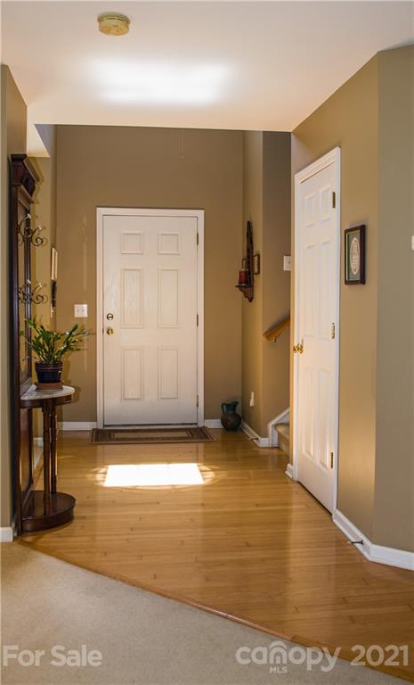 144 Amber Woods Drive Tega Cay, SC 29708 - Photo 5 of 37 a view of a livingroom with a patio