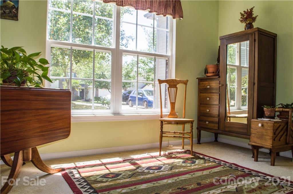 144 Amber Woods Drive Tega Cay, SC 29708 - Photo 10 of 37 a living room with couch