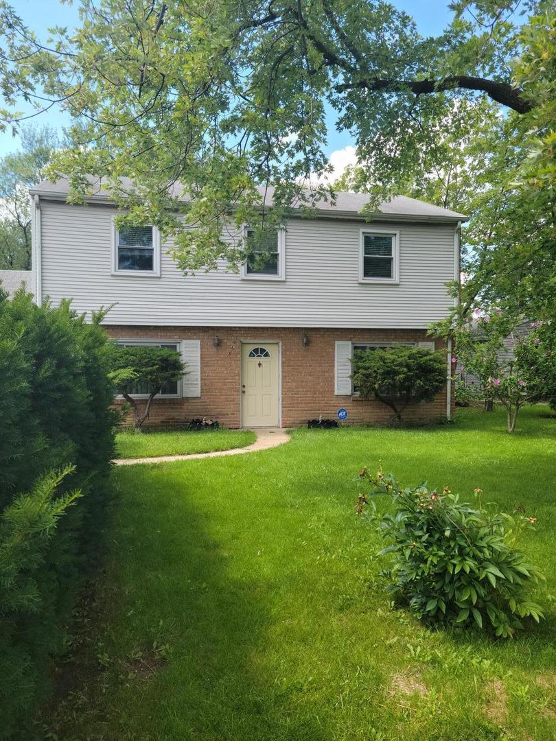 568 Redwood Road Bolingbrook, IL 60440 - Photo 1 of 1 a front view of house with yard and green space