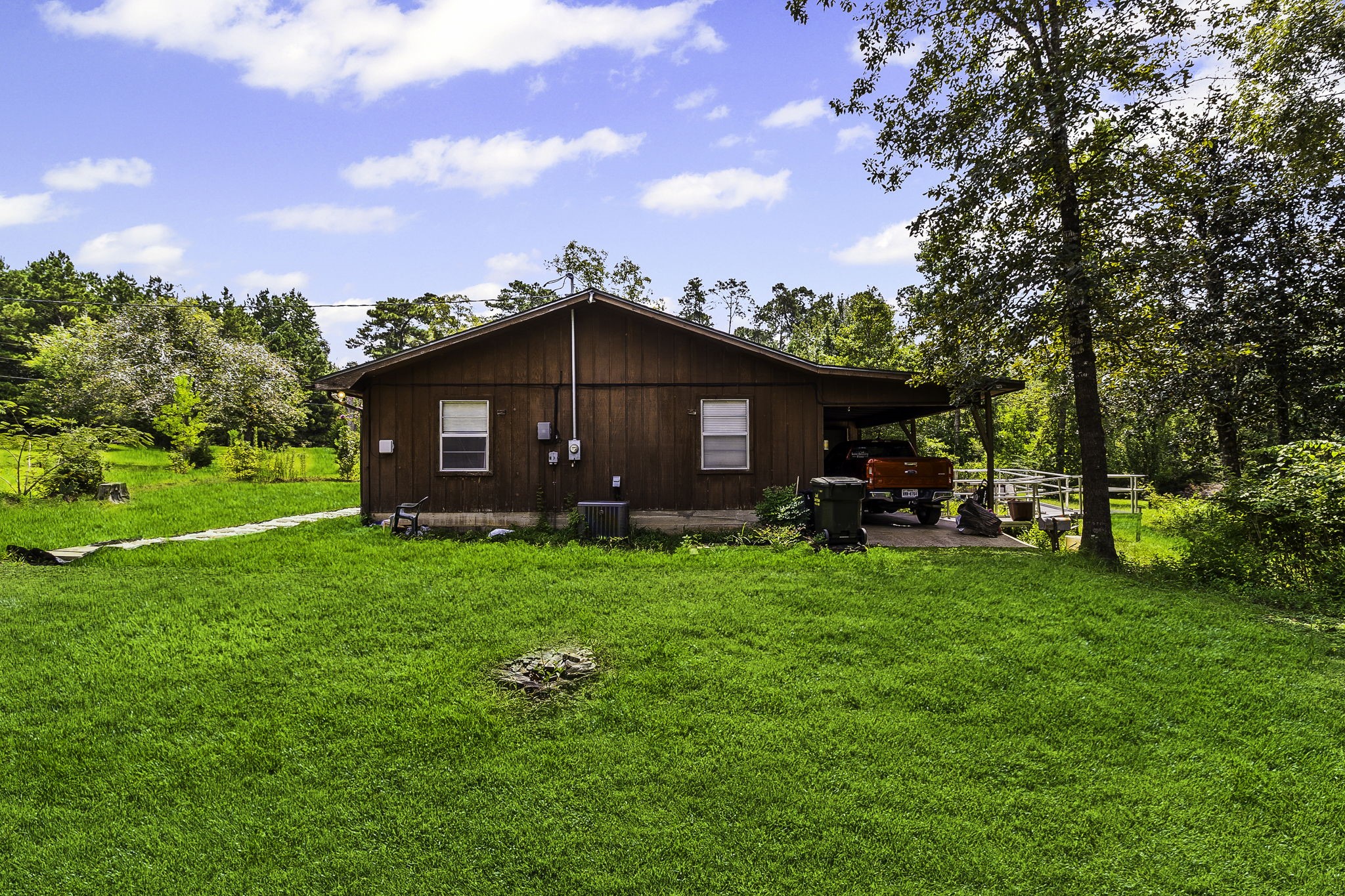 271 Ivanhoe Ranchettes Drive Ivanhoe, TX 75979 - Photo 18 of 40 a view of a house with backyard