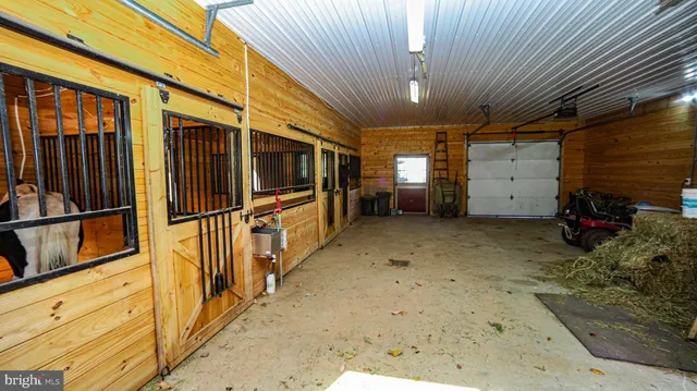 a view of a porch with wooden fence