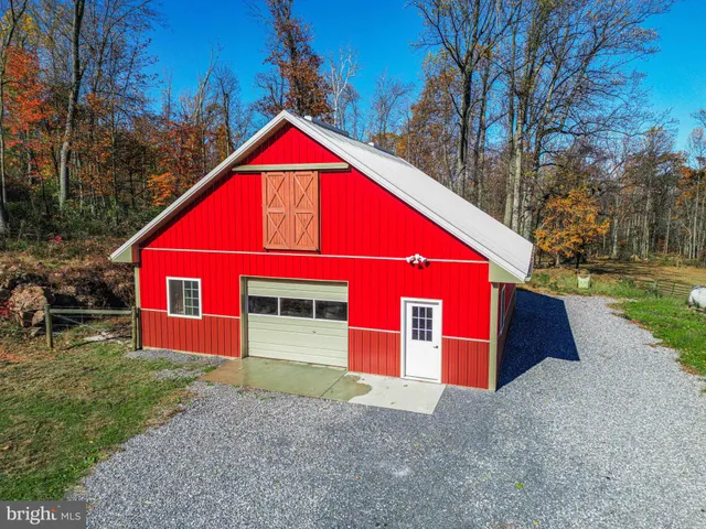 a view of street with small yard