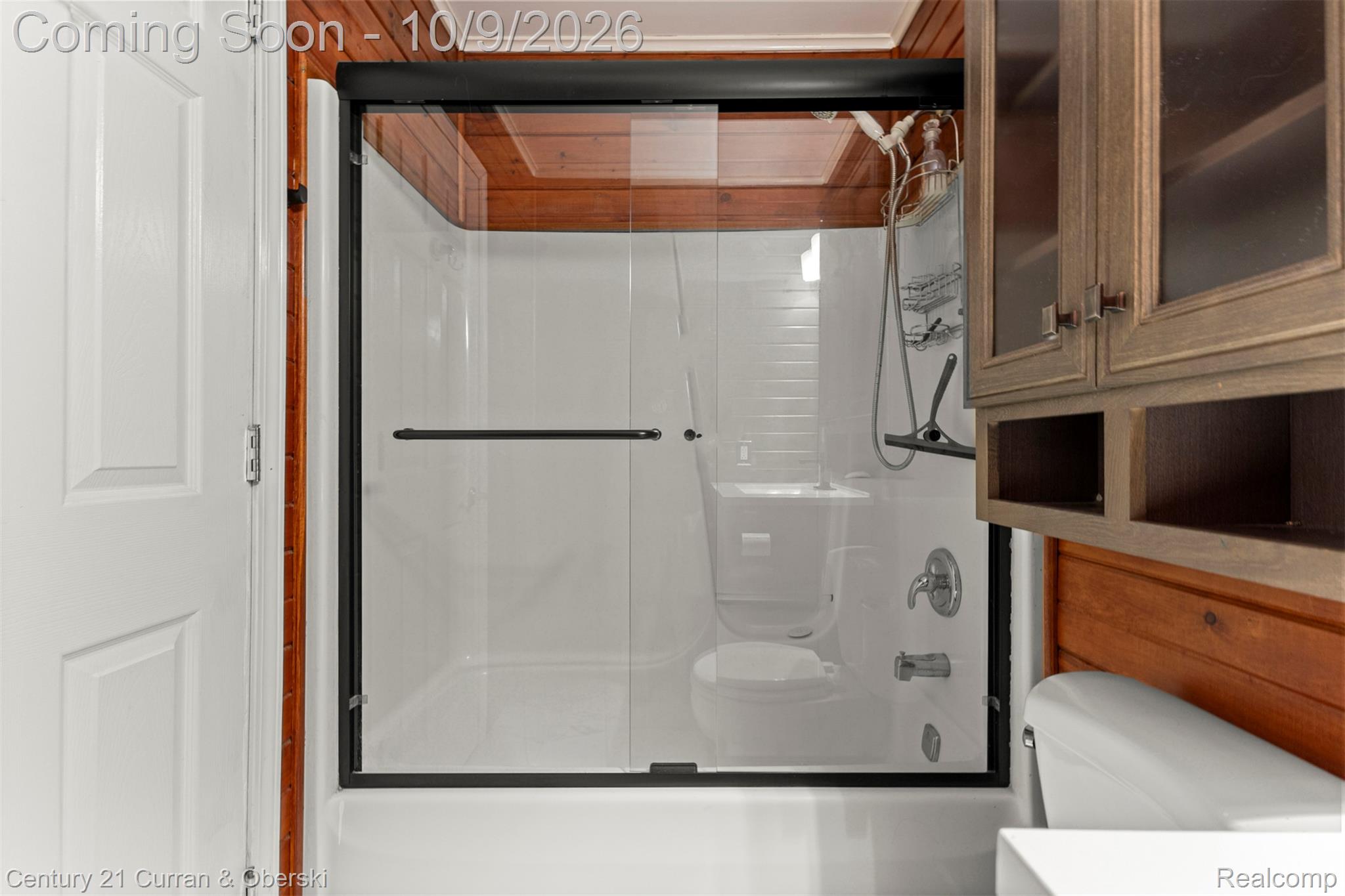 43040 Willis Road Belleville, MI 48111 - Photo 32 of 65 Tub/shower combination with clear glass enclosure and matte black frame