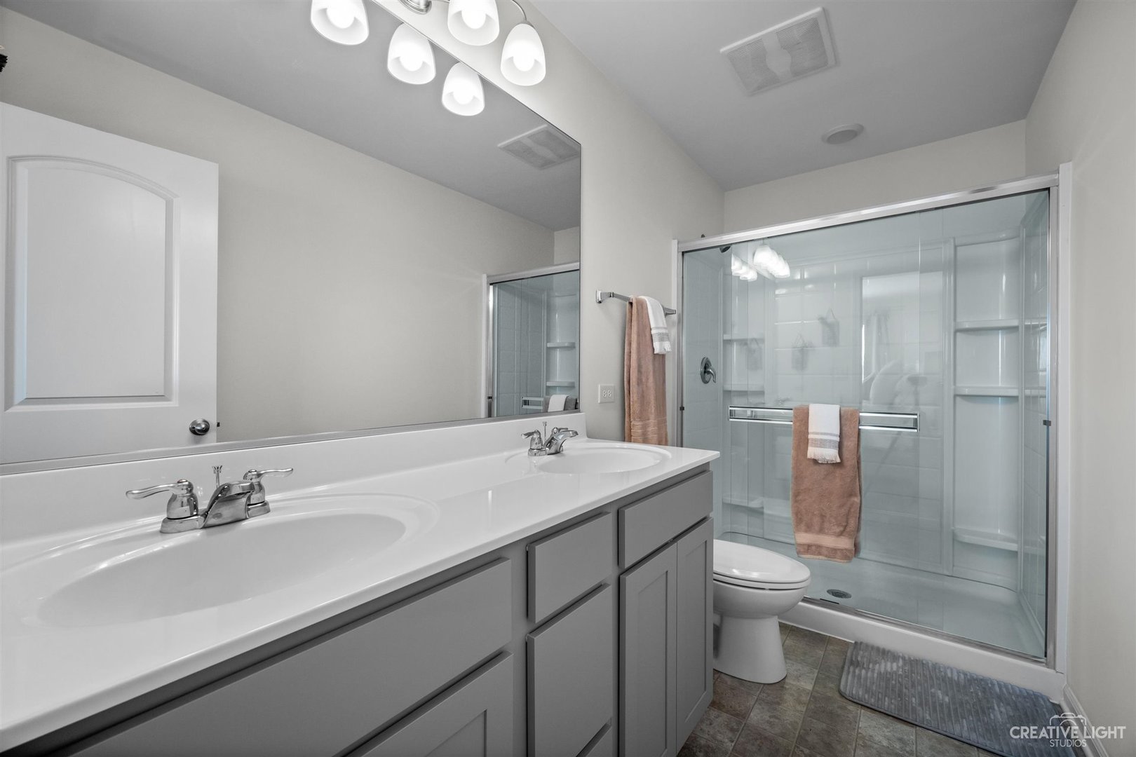 2342 Upland Road Pingree Grove, IL 60140 - Photo 12 of 22 a bathroom with a sink a toilet and shower