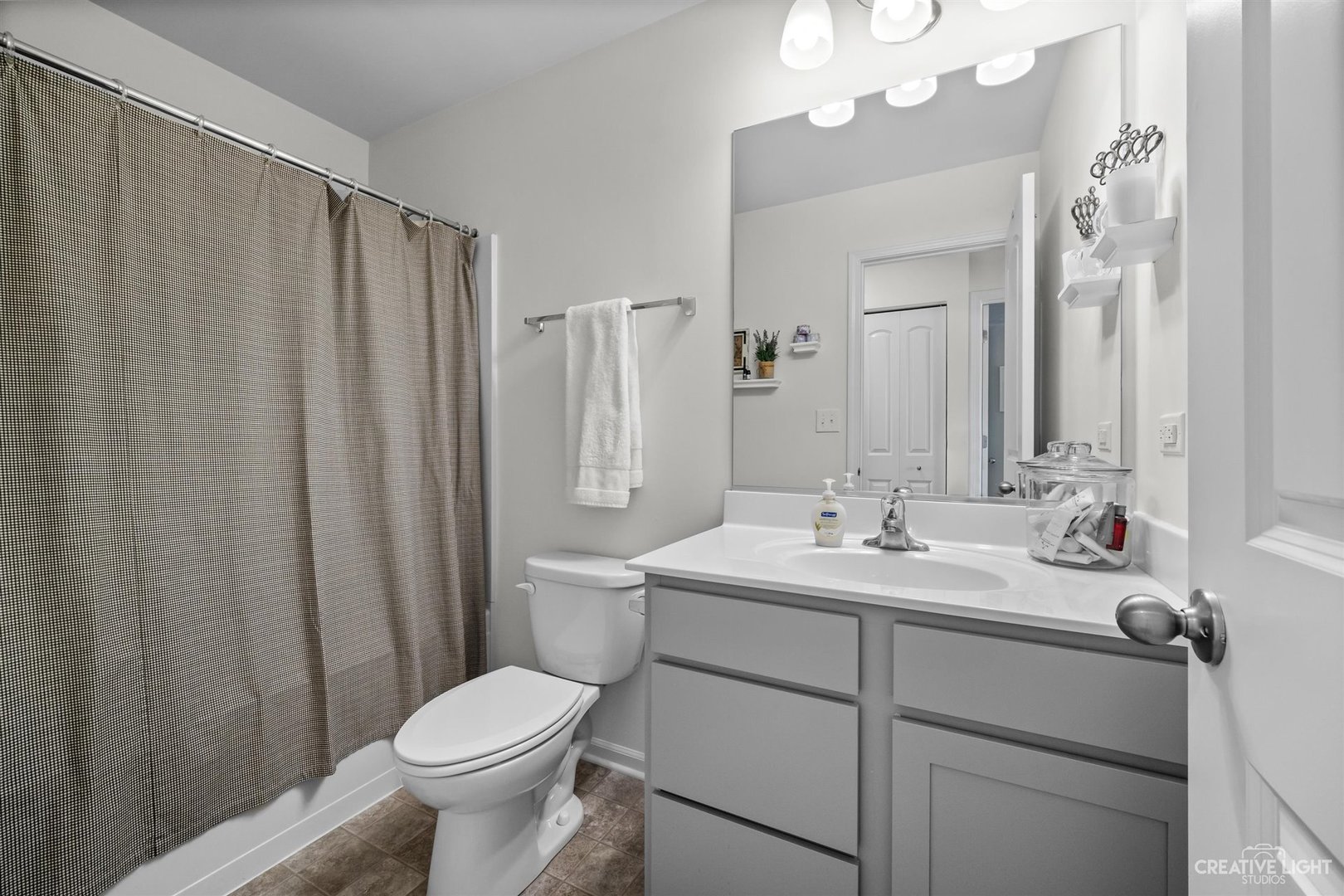 2342 Upland Road Pingree Grove, IL 60140 - Photo 15 of 22 a bathroom with a sink a toilet and mirror