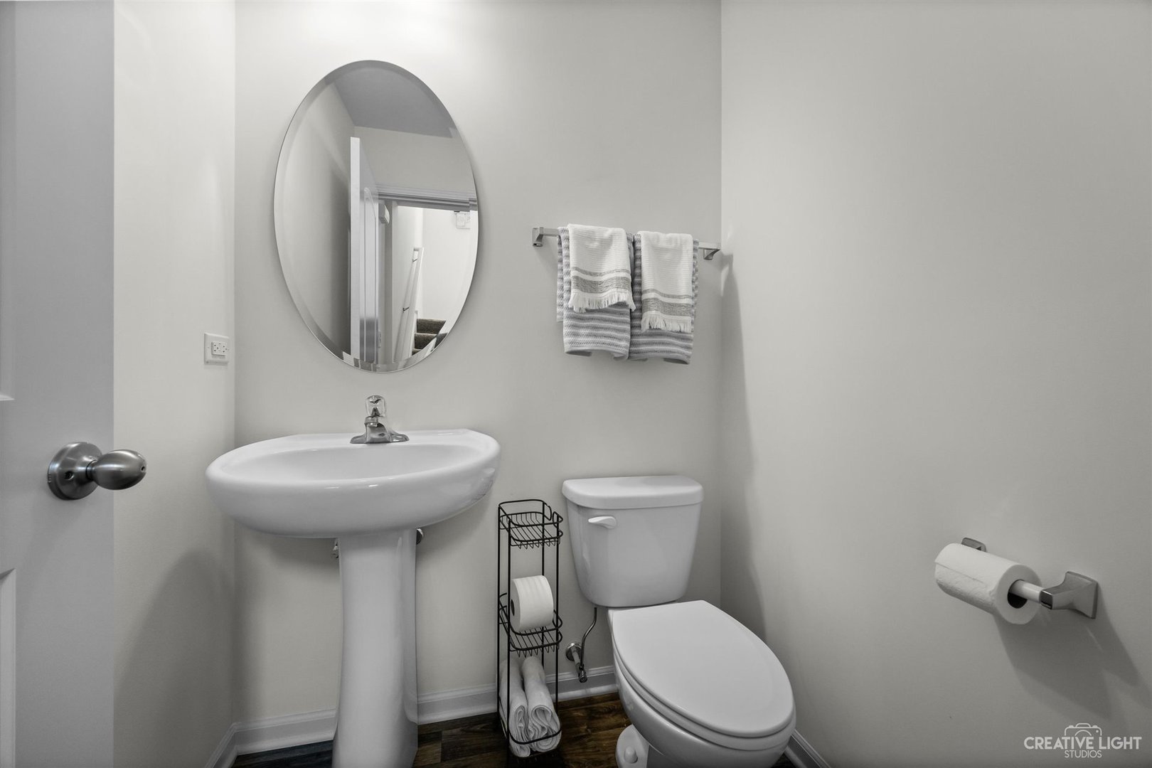 2342 Upland Road Pingree Grove, IL 60140 - Photo 16 of 22 a bathroom with a toilet a sink and a mirror