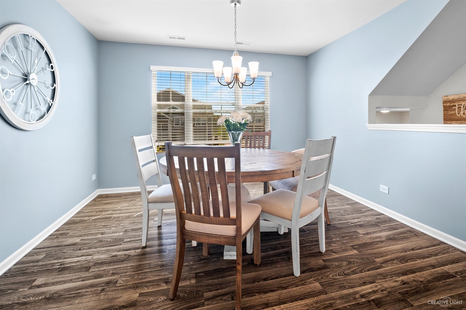 2342 Upland Road Pingree Grove, IL 60140 - Photo 9 of 22 a view of a dining room with furniture window and wooden floor
