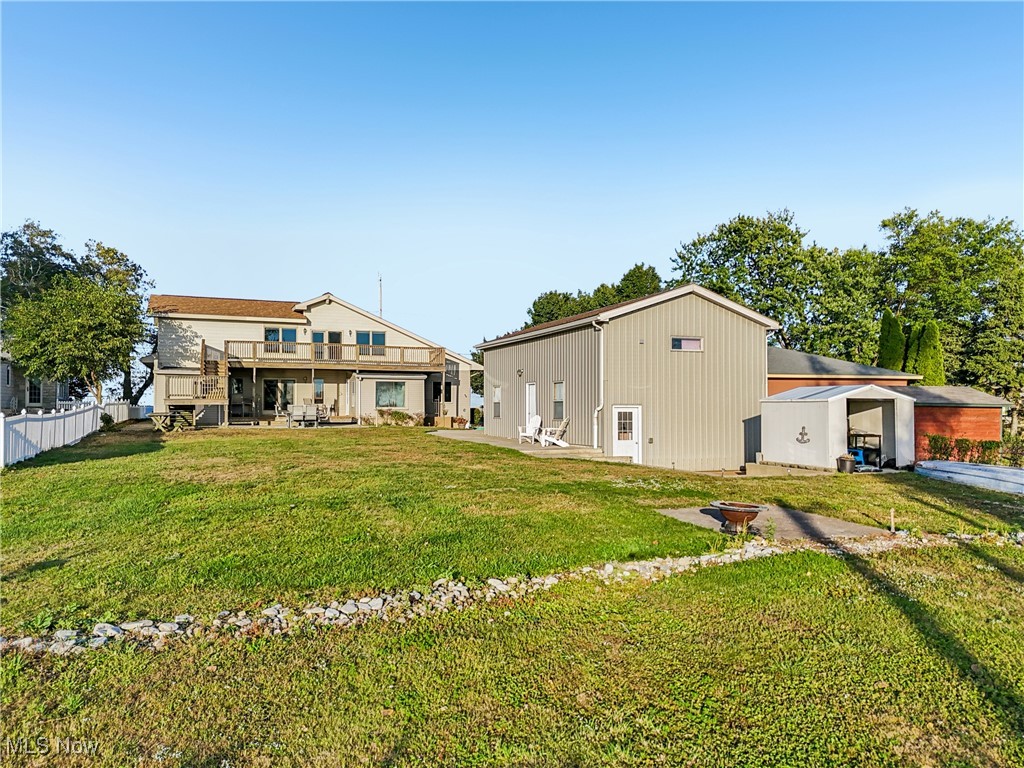 337 Cedar Point Road Sandusky, OH 44870 - Photo 40 of 50 Rear view of house with a patio and an outbuilding