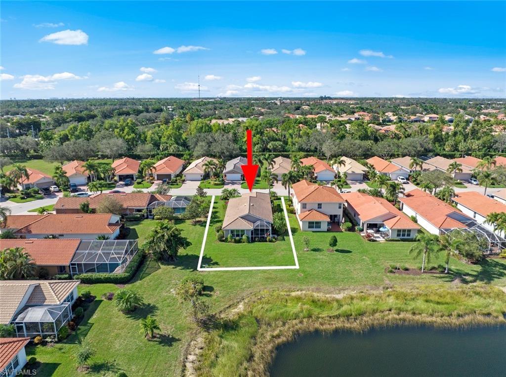19647 Villa Rosa Loop Estero, FL 33967 - Photo 1 of 48 an aerial view of residential houses with outdoor space and swimming pool