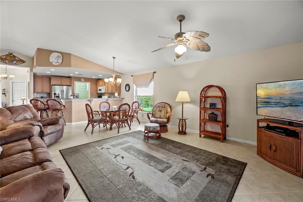 19647 Villa Rosa Loop Estero, FL 33967 - Photo 13 of 48 a living room with furniture and wooden floor