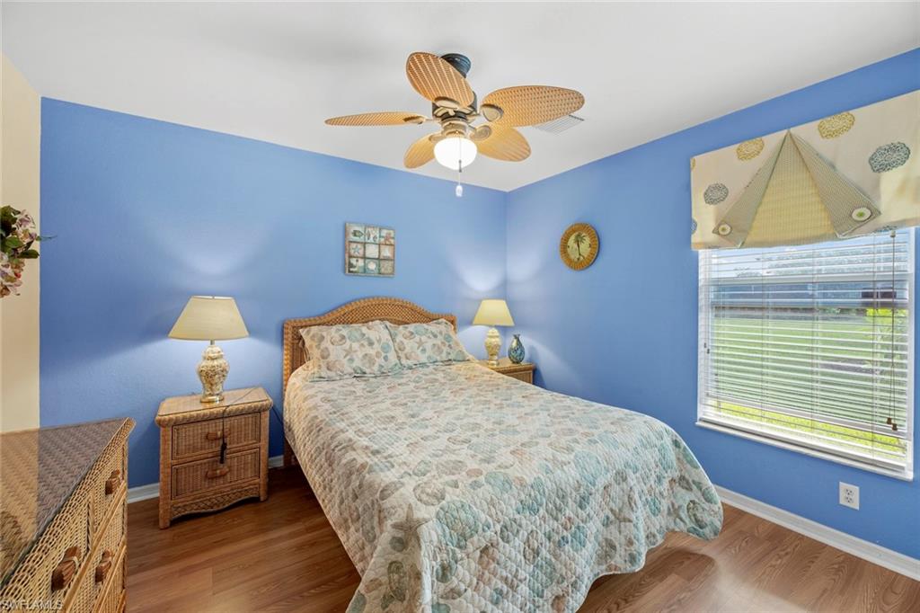 19647 Villa Rosa Loop Estero, FL 33967 - Photo 25 of 48 a bedroom with a bed and a window