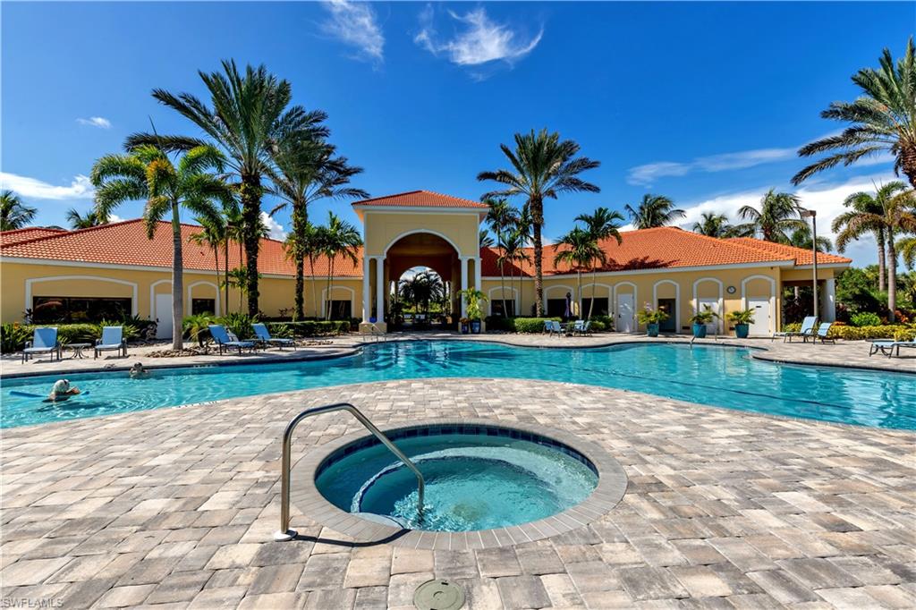 19647 Villa Rosa Loop Estero, FL 33967 - Photo 42 of 48 a view of swimming pool and outdoor seating