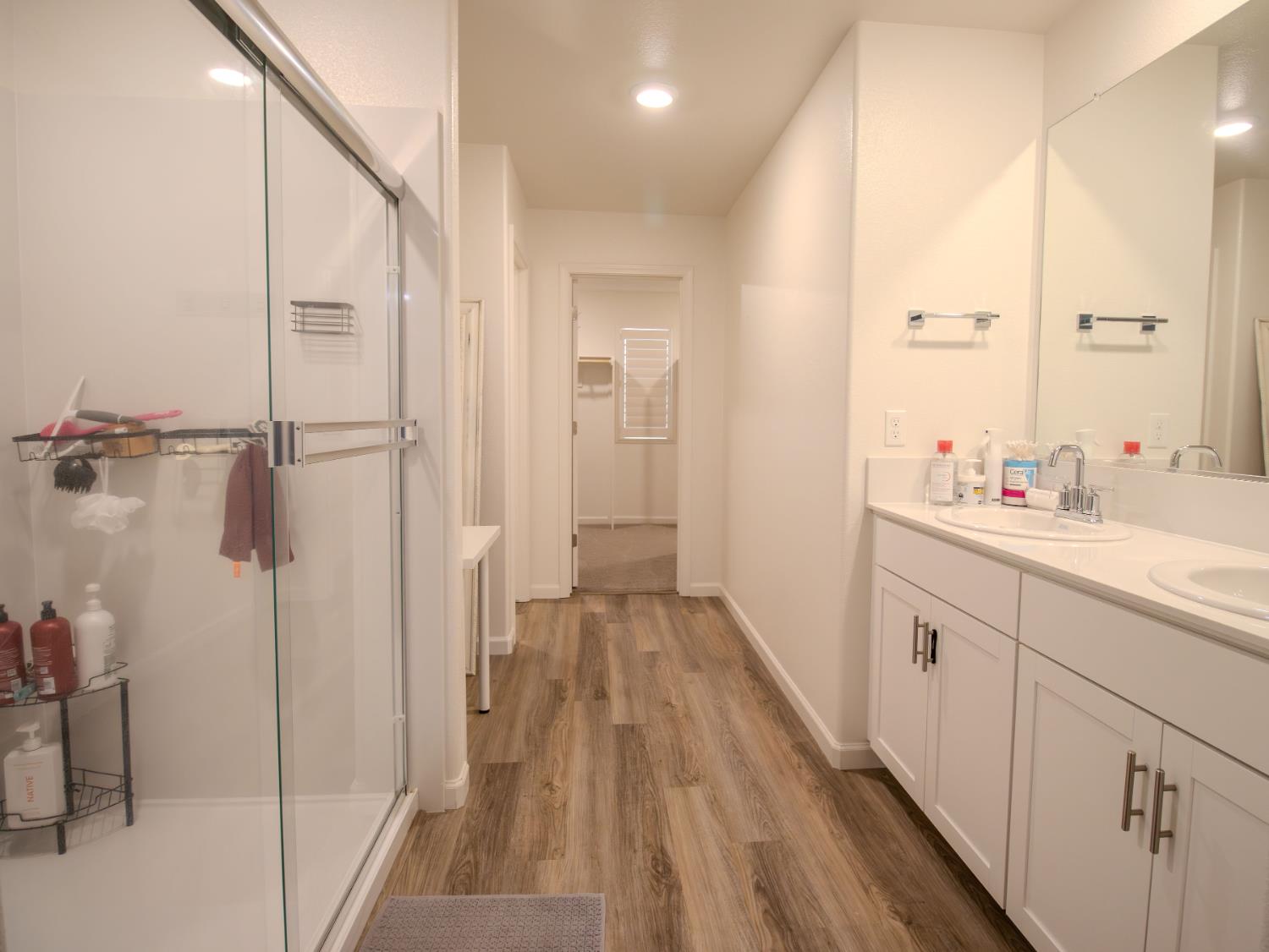 1451 Ryan Avenue Fowler, CA 93625 - Photo 14 of 23 a bathroom with a sink and a mirror