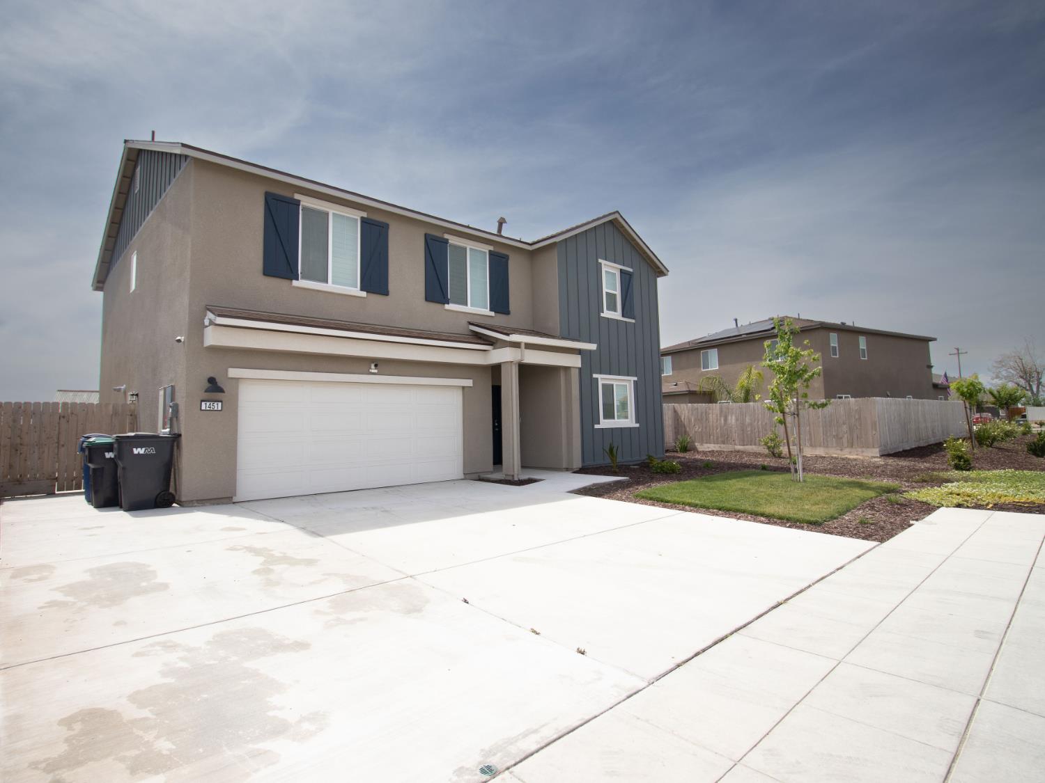 1451 Ryan Avenue Fowler, CA 93625 - Photo 2 of 23 a house view with a outdoor space
