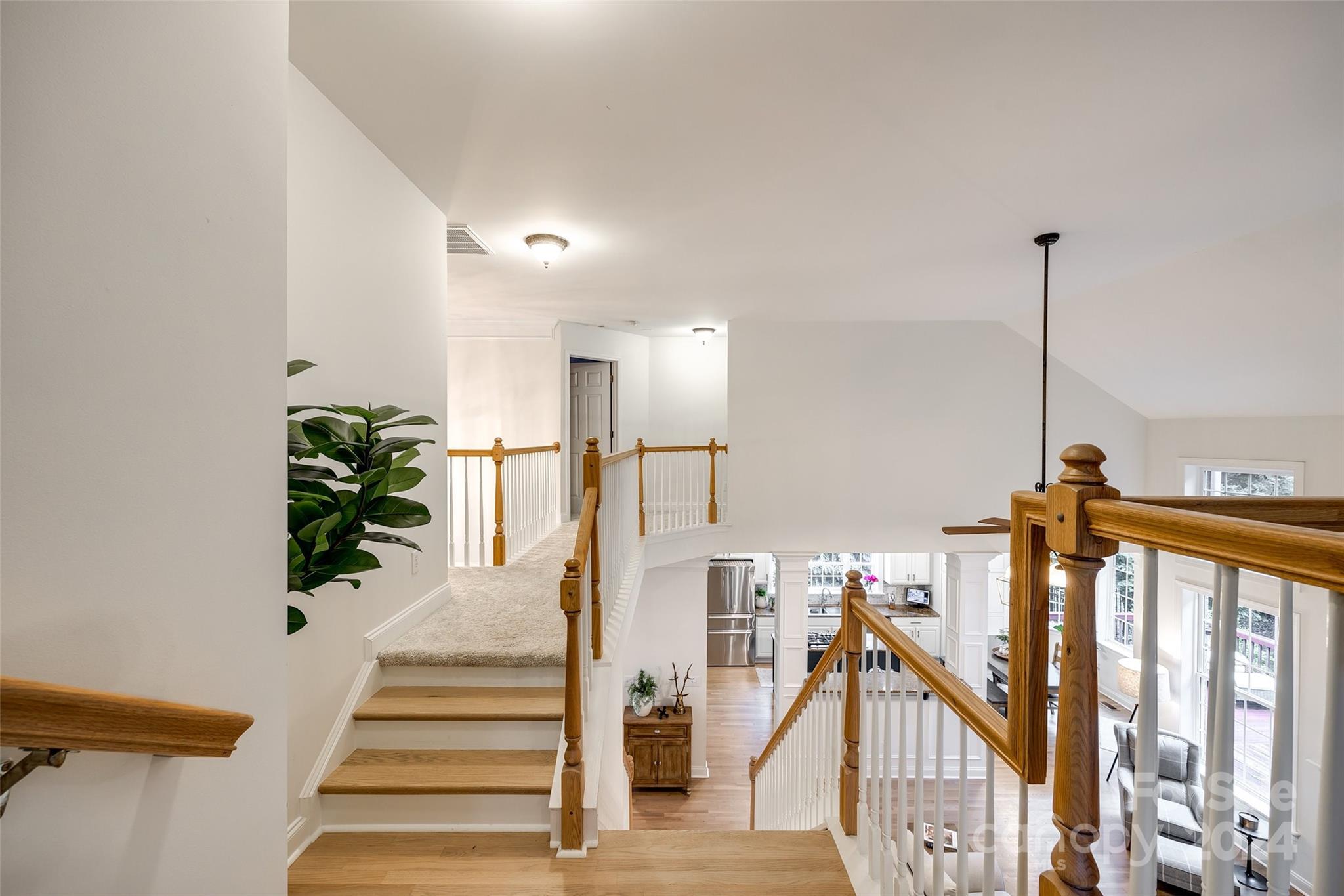 2004 Emerald Pines Drive Tega Cay, SC 29708 - Photo 21 of 30 a view of a hallway with staircase