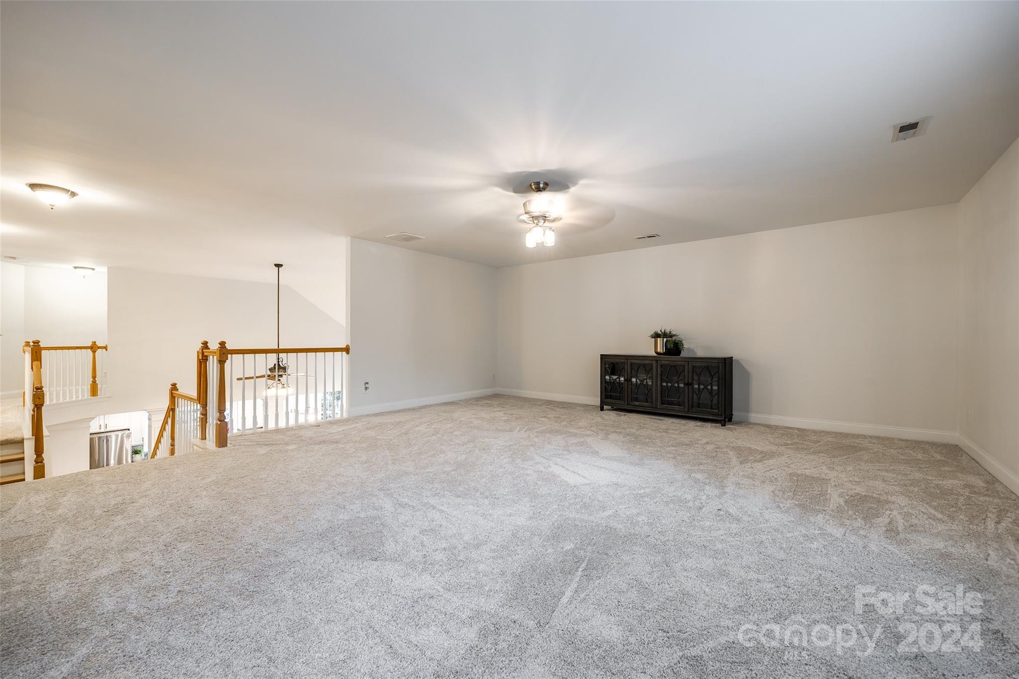 2004 Emerald Pines Drive Tega Cay, SC 29708 - Photo 22 of 30 a view of kitchen with furniture and a chandelier