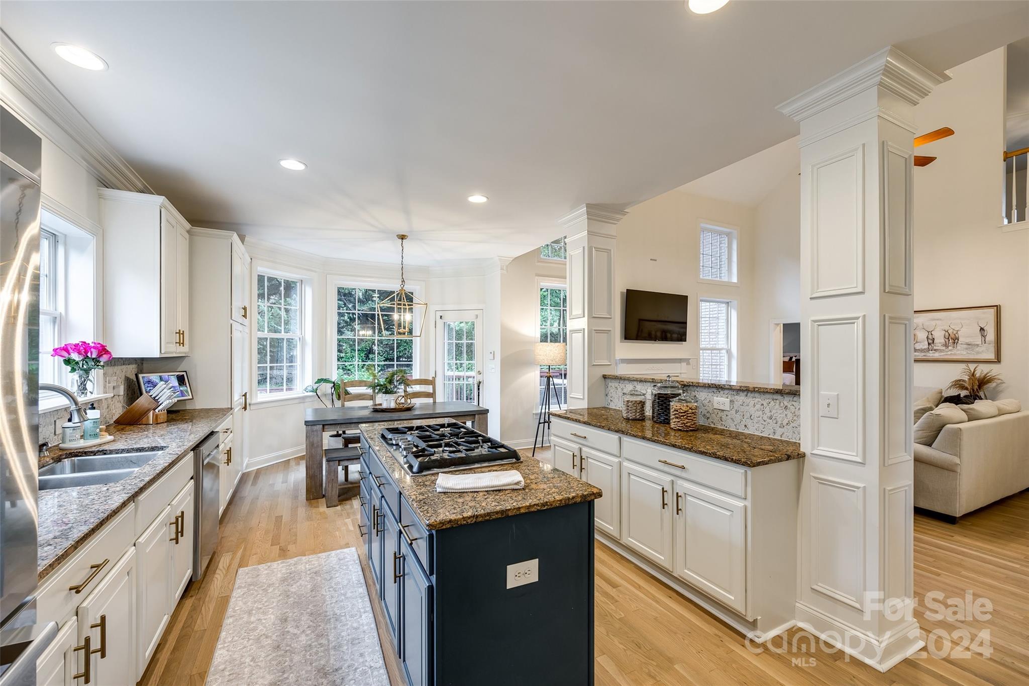 2004 Emerald Pines Drive Tega Cay, SC 29708 - Photo 8 of 30 a kitchen with sink stove and refrigerator