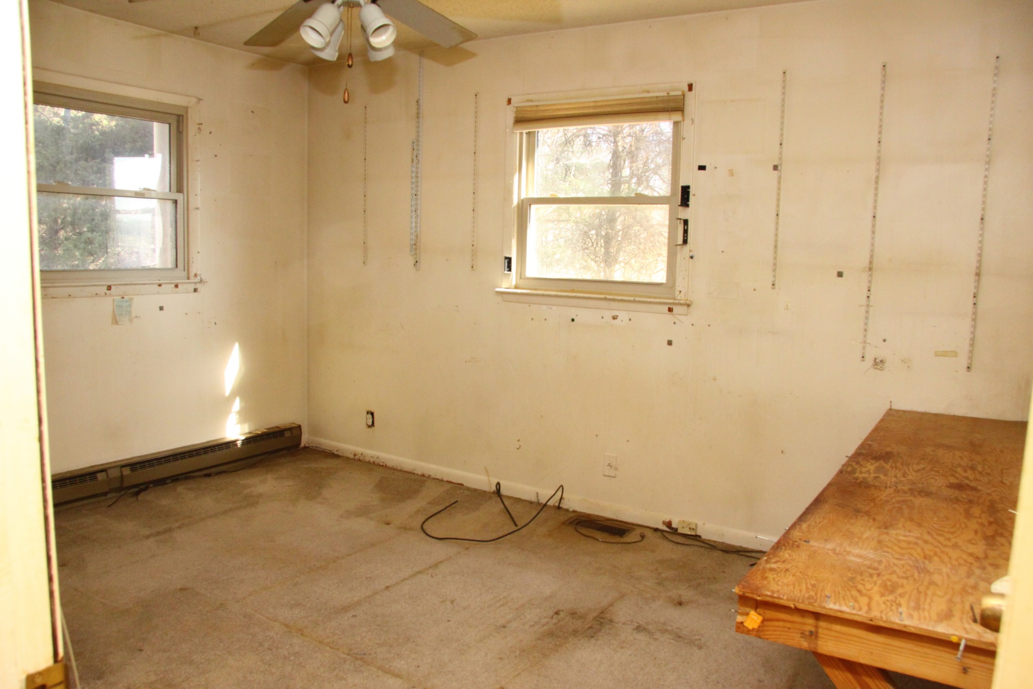 8818 Newtown Road Rockvale, TN 37153 - Photo 13 of 17 an empty room with windows