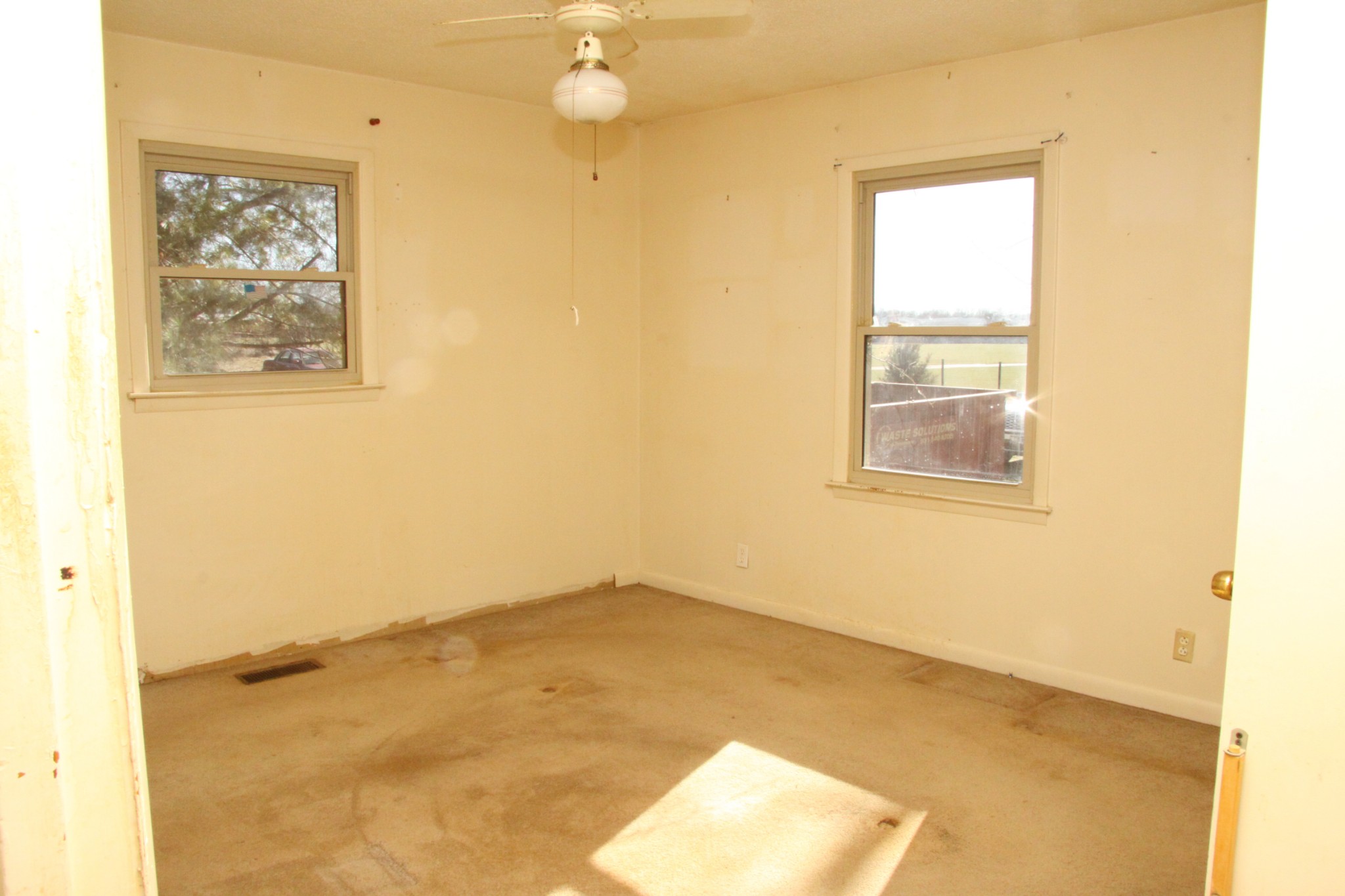 8818 Newtown Road Rockvale, TN 37153 - Photo 9 of 17 an empty room with windows