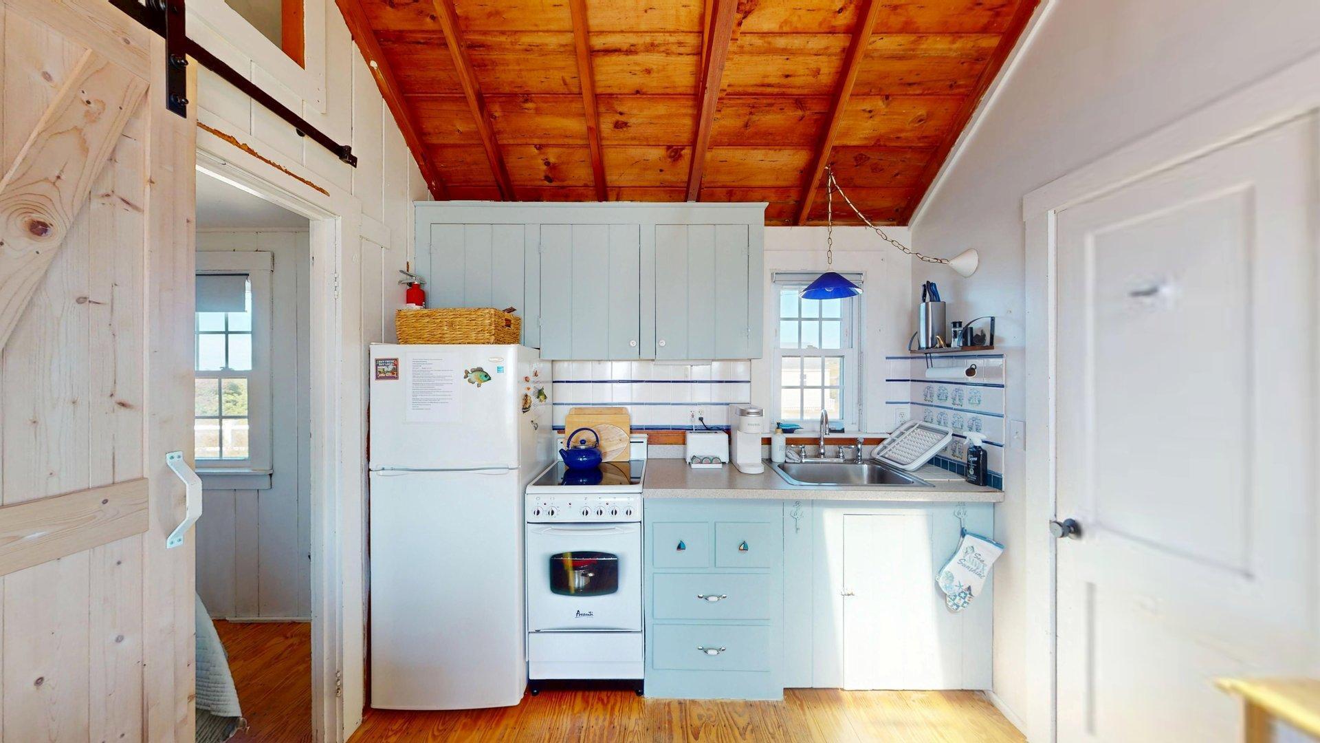 334 Shore Road, Unit 11 Truro, MA 02666 - Photo 9 of 20 334 shore kitchen long view