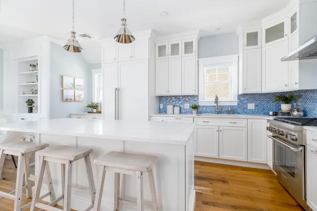 a bedroom with furniture and a wooden floor